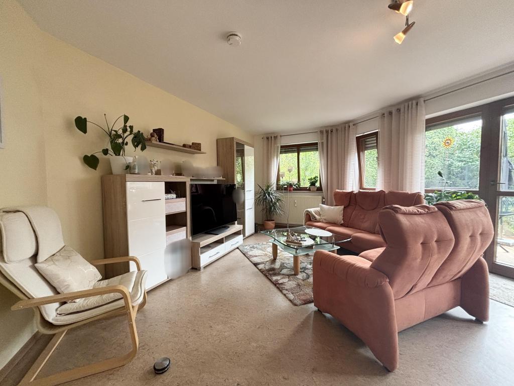 Attraktive 2-Zimmer-Wohnung mit Terrasse, Garten und Carport - Foto 1