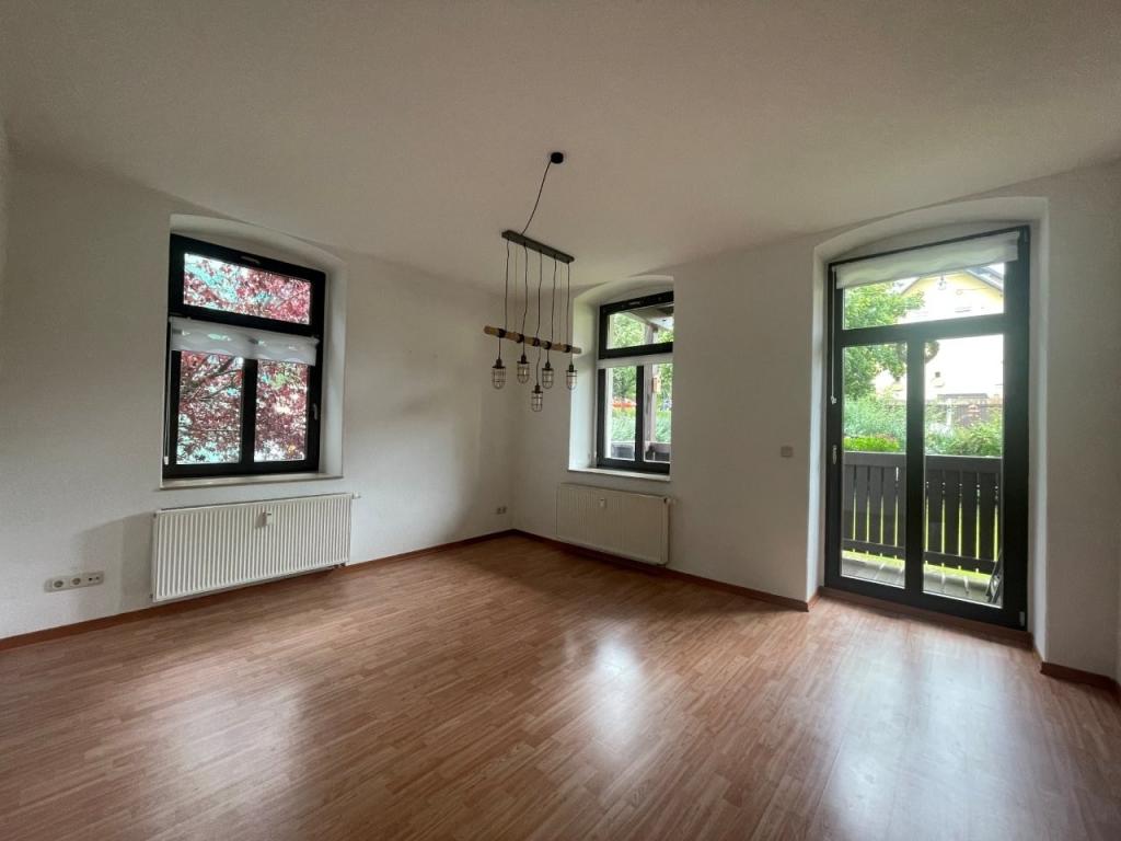Wohnzimmer mit Balkon