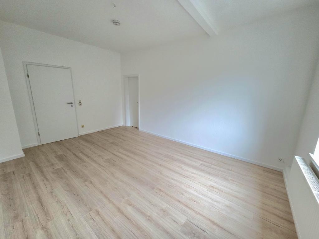 Schicke 3-Zimmer-Dachgeschosswohnung in zentraler Lage von Stollberg! - Foto 1