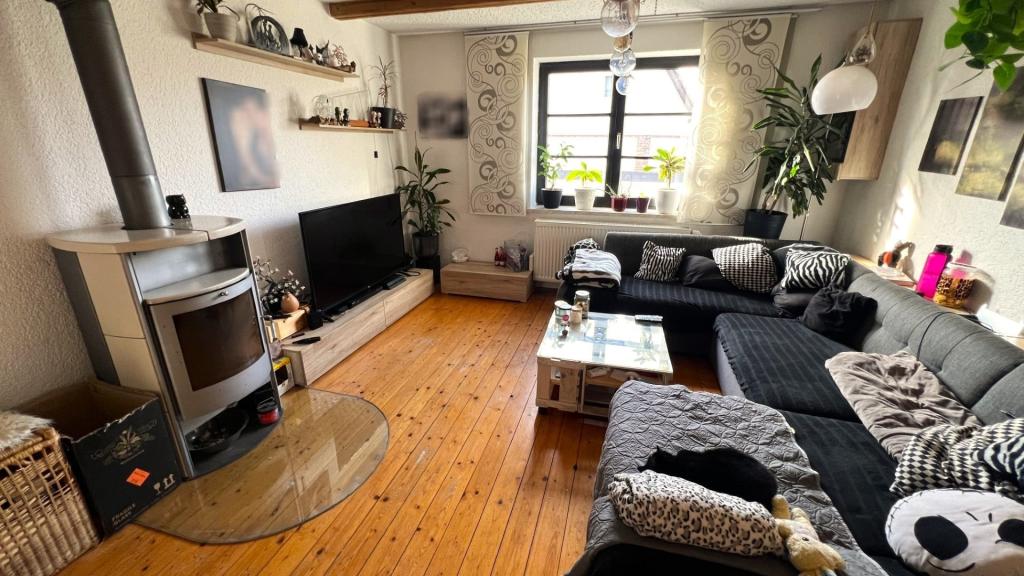 Wohnzimmer mit Kamin