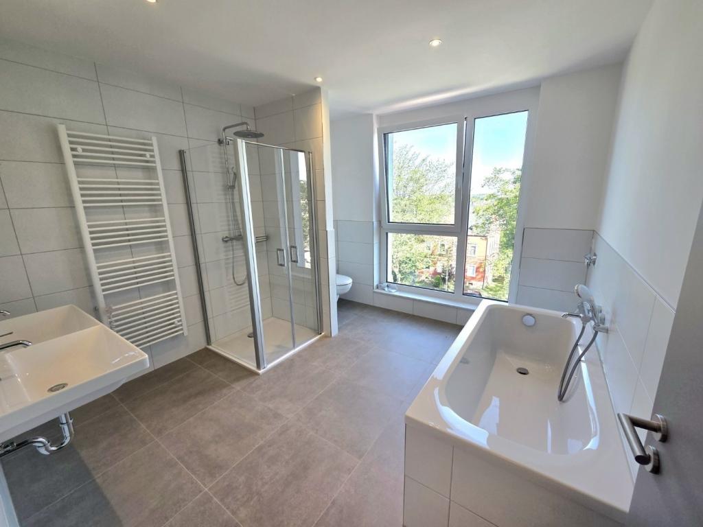 Erstbezug! Moderne 3-Zimmerwohnung mit Garagenstellplatz! - Foto 4