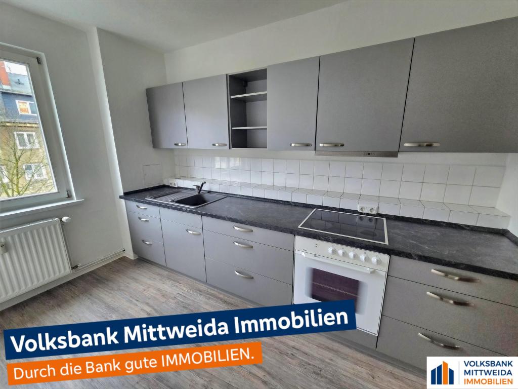 Attraktive 3-Zimmer-Wohnung mit Einbauküche und Loggia in Chemnitz-Hilbersdorf! - Photo 2
