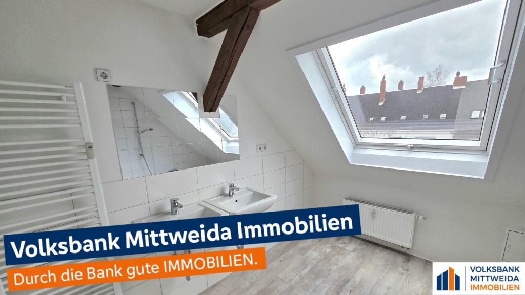 Gemütliche 3-Zimmer-Dachgeschosswohnung mit Sichtbalken in Chemnitz-Hilbersdorf! - Photo 3