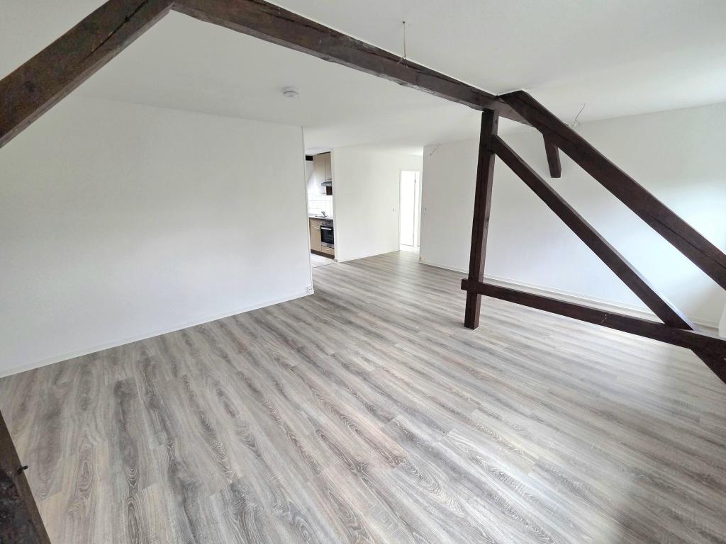2-Zimmer-Dachgeschosswohnung mit Einbauküche in Chemnitz-Hilbersdorf! - Photo 1