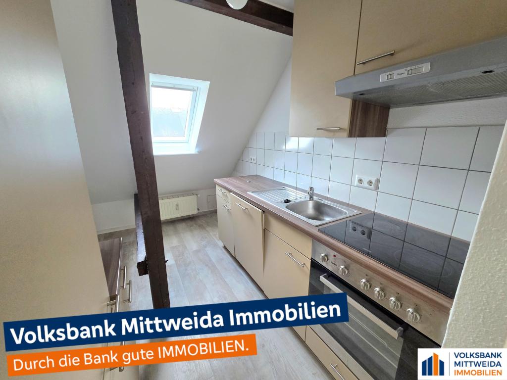 2-Zimmer-Dachgeschosswohnung mit Einbauküche in Chemnitz-Hilbersdorf! - Photo 2