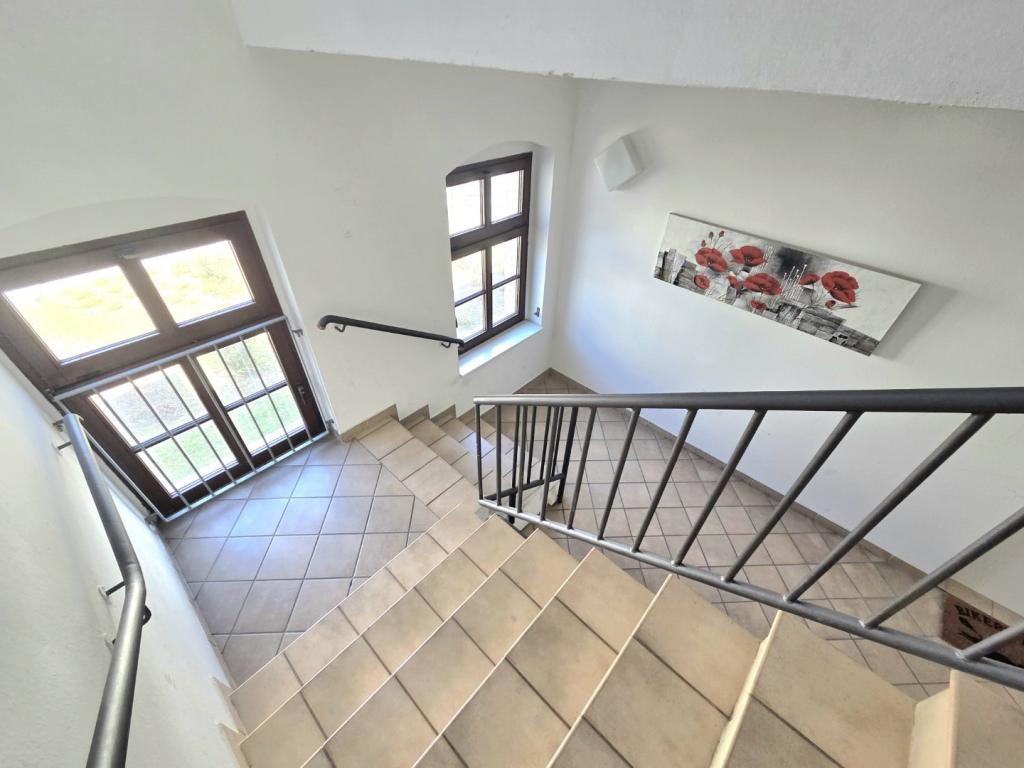 Viel Platz unterm Dach: 5‑Zimmer-Wohnung mit Sichtbalken & Tageslichtbad! - Foto 4