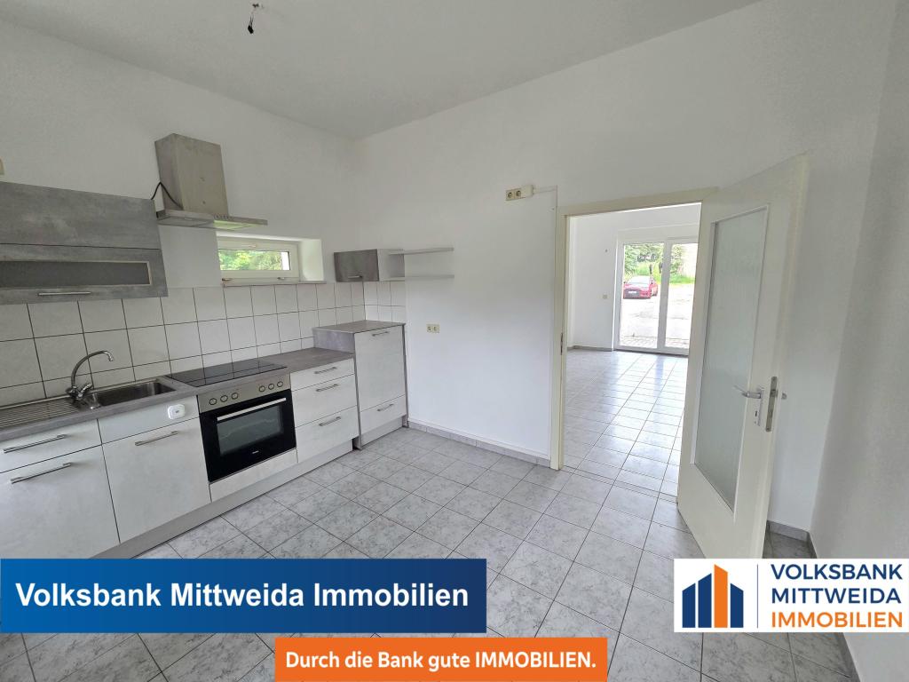 Charmantes 1-Zimmer-Apartment mit Einbauküche und Terrasse im Grünen! - Foto 5