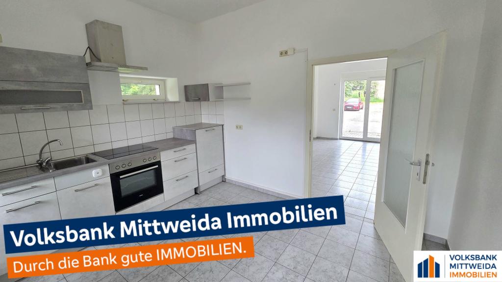 Charmantes 1-Zimmer-Apartment mit Einbauküche und Terrasse im Grünen! - Foto 3