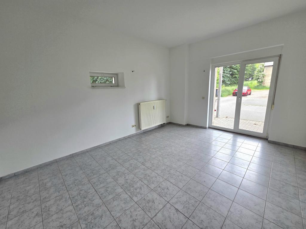Charmantes 1-Zimmer-Apartment mit Einbauküche und Terrasse im Grünen! - Foto 2