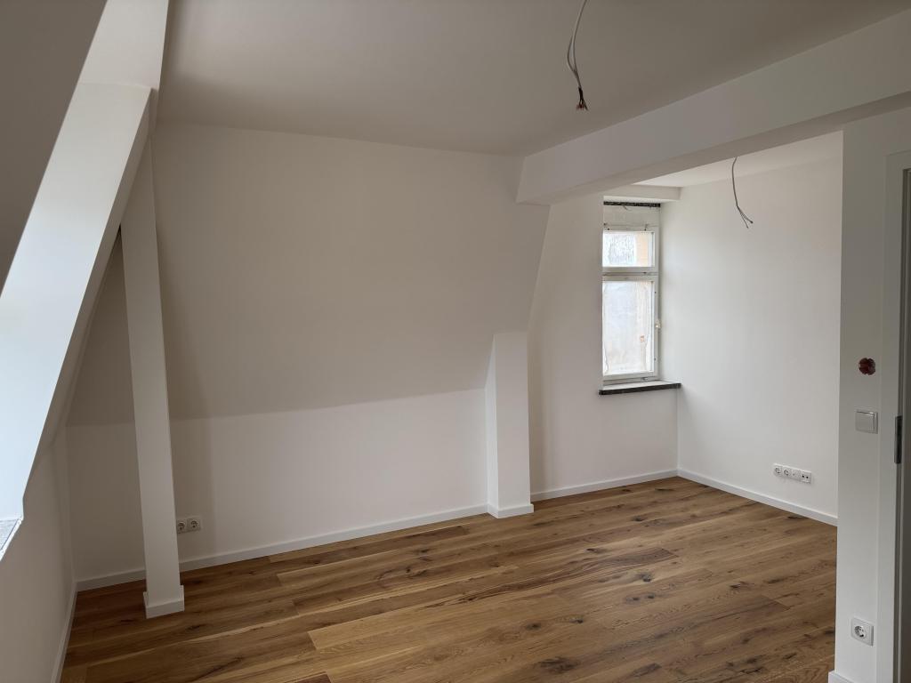 Moderne Dachgeschosswohnung mit Tageslichtbad in Altmittweida - Erstbezug! - Foto 4