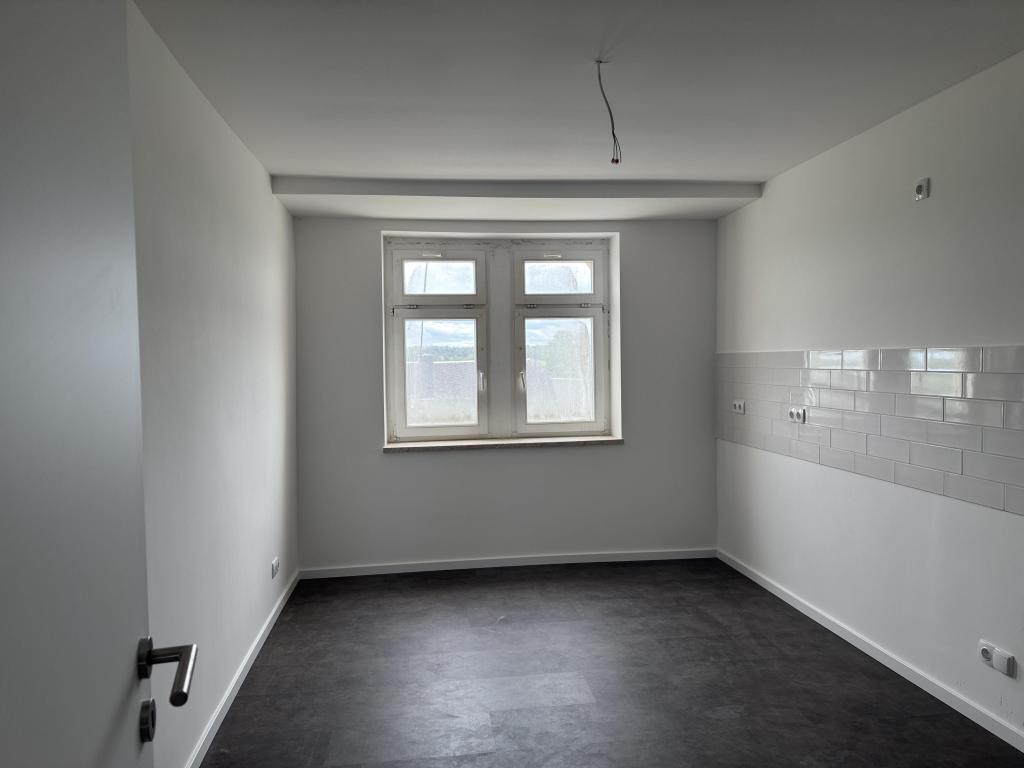 Moderne Dachgeschosswohnung mit Tageslichtbad in Altmittweida - Erstbezug! - Foto 1