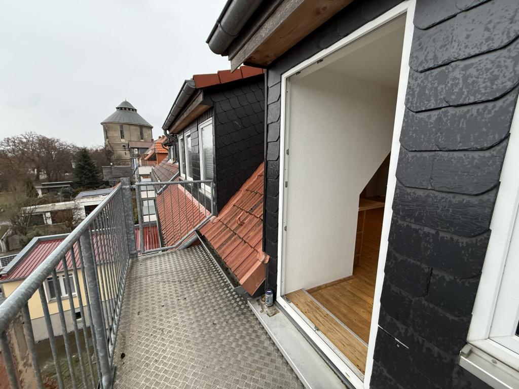 Schöne Dachgeschosswohnung in Halberstadt - Foto 3