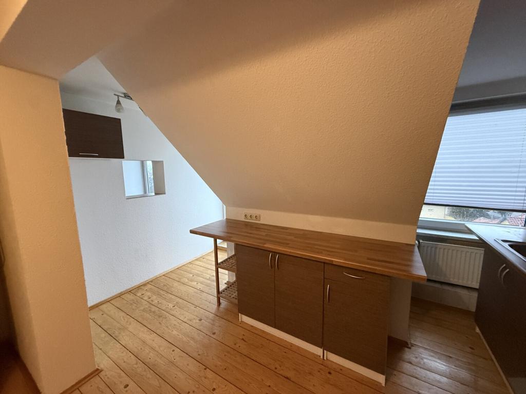 Schöne Dachgeschosswohnung in Halberstadt - Foto 1