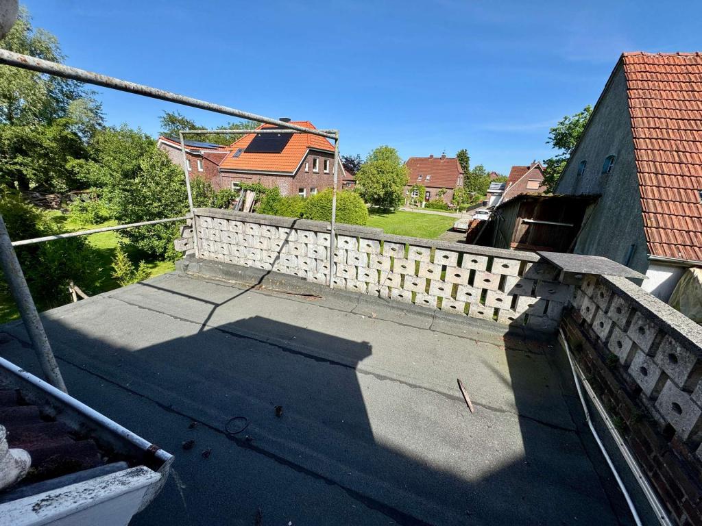 Großzügige Obergeschosswohnung mit Dachterrasse und Gartennutzung in Wiarden - Photo 4