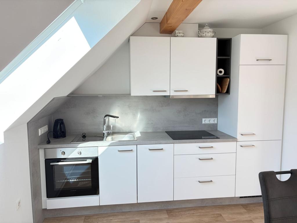 Möblierte Dachgeschoßwohnung im Reisenbacher Grund - Photo 5