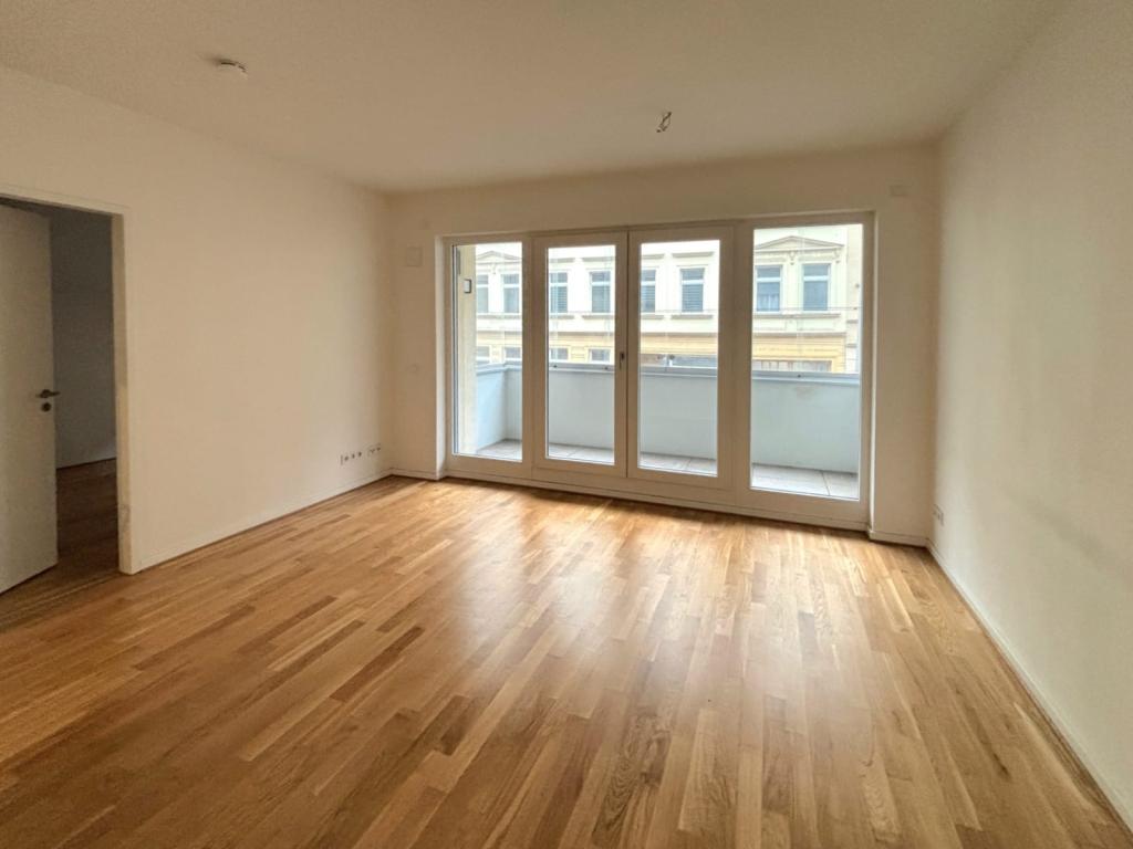 Kuschelige 2-Zimmer-Wohnung mit einem sonnigen Wintergarten - Foto 1