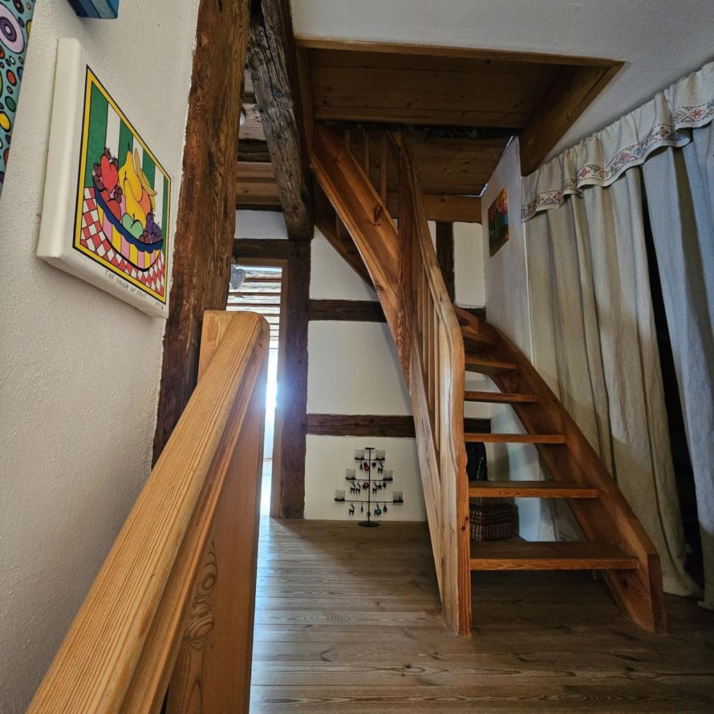 Treppenaufgang zum Spitzgiebel