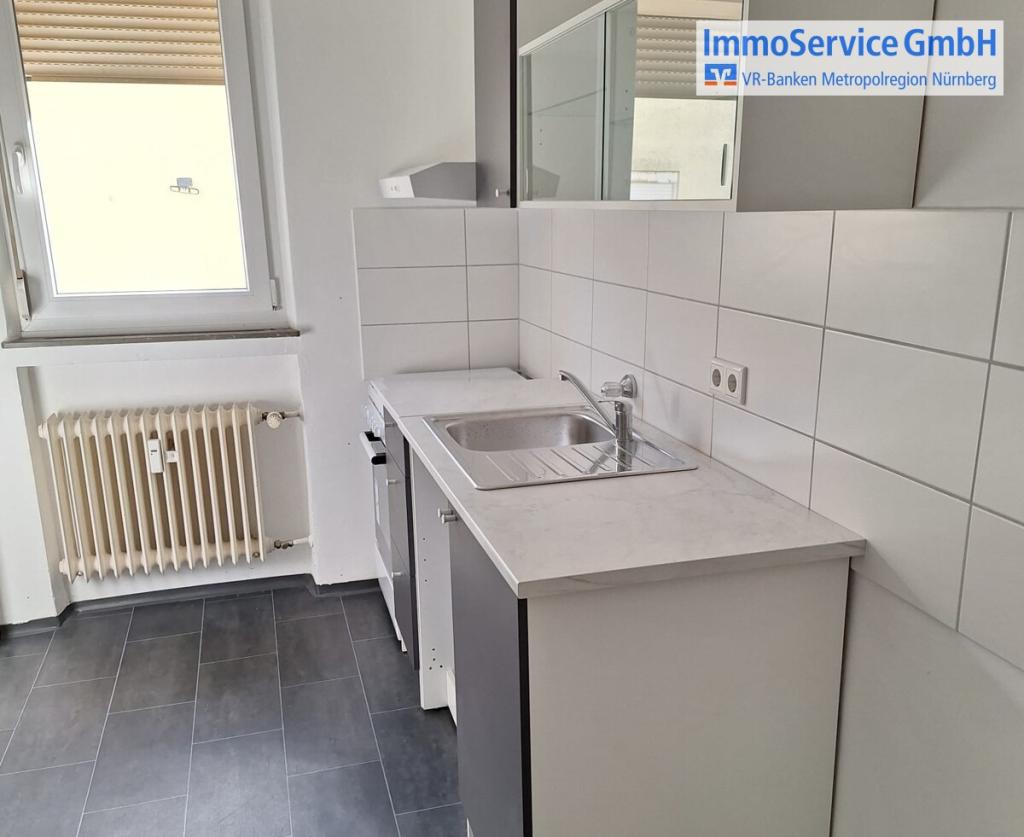 Praktische 2-Zimmer-Erdgeschosswohnung mit Einbauküche in Nürnberg-Höfles - Foto 3