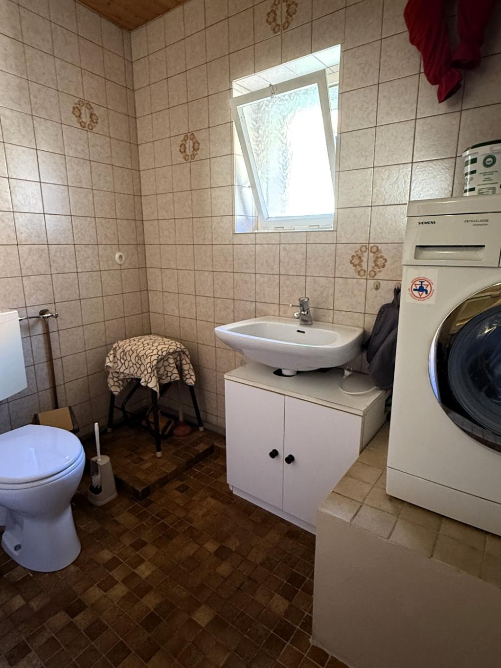 13 WC mit Hauswirtschaftsraum