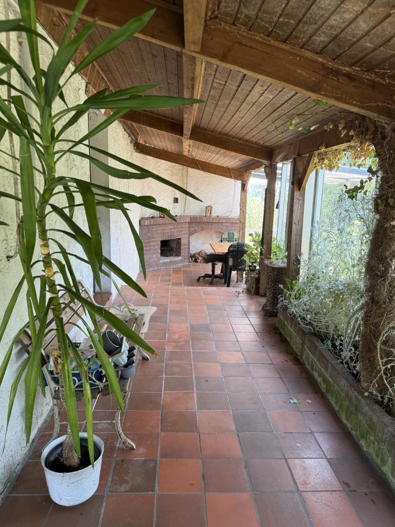 13 Überdachte Terrasse am Hauseingang