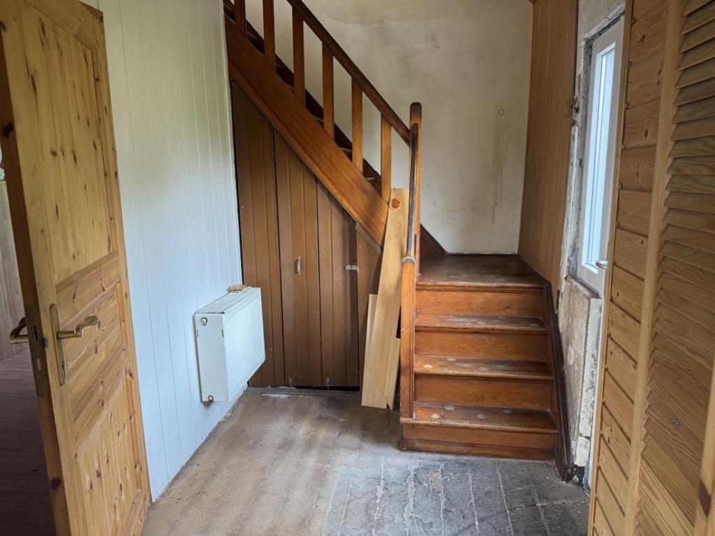Holztreppe in das Dachgeschoss