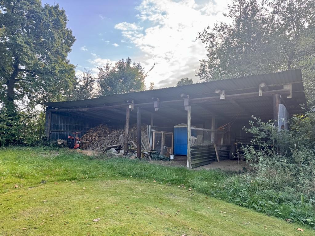 Holzlager / Carport 