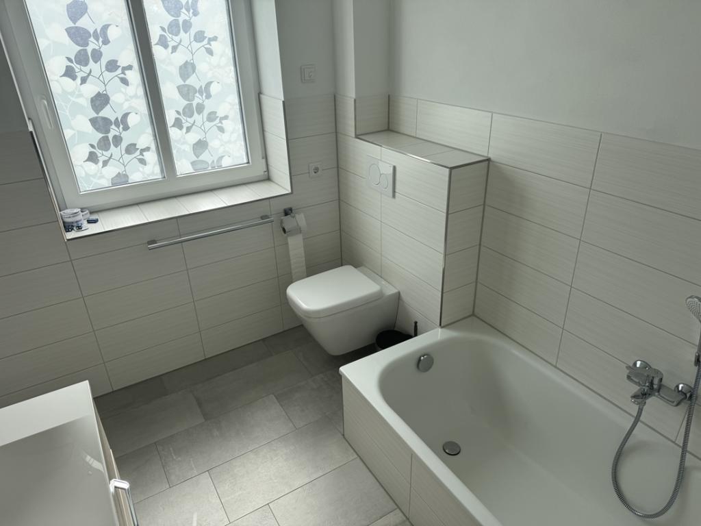 Einziehen & wohlfühlen: Neuwertige Eigentumswohnung mit Balkon in Meldorf zu vermieten! - Photo 5