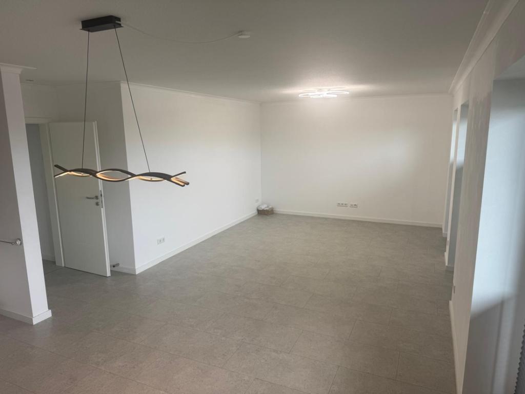 Einziehen & wohlfühlen: Neuwertige Eigentumswohnung mit Balkon in Meldorf zu vermieten! - Photo 1
