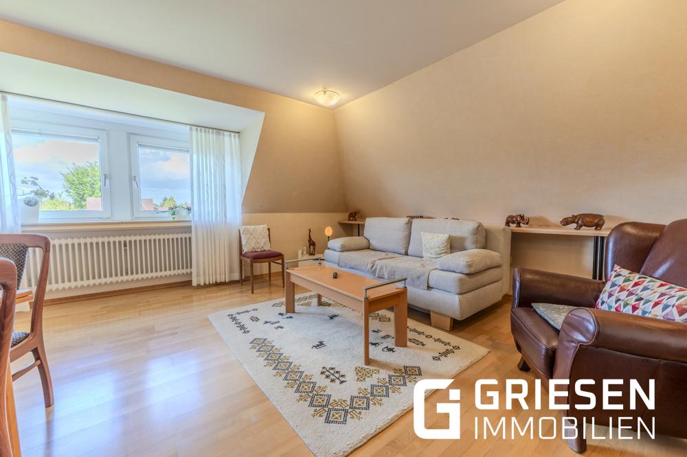 Wohnen mit Freiraum: Großzügige Dachgeschosswohnung mit Balkon & Gartenanteil in zentraler Lage von Haren (Ems) - Foto 1