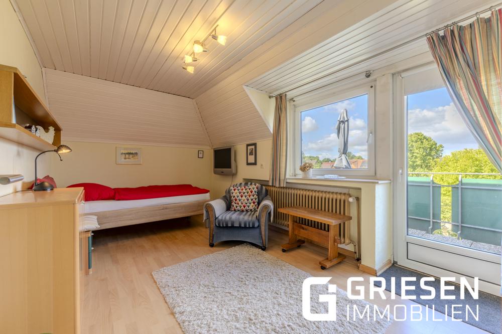 Wohnen mit Freiraum: Großzügige Dachgeschosswohnung mit Balkon & Gartenanteil in zentraler Lage von Haren (Ems) - Foto 3