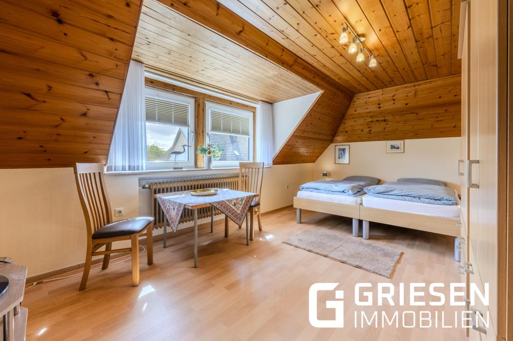 Wohnen mit Freiraum: Großzügige Dachgeschosswohnung mit Balkon & Gartenanteil in zentraler Lage von Haren (Ems) - Foto 4