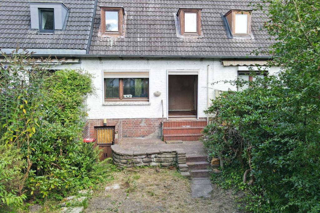 Rückseite des Hauses mit geschützter Terrasse