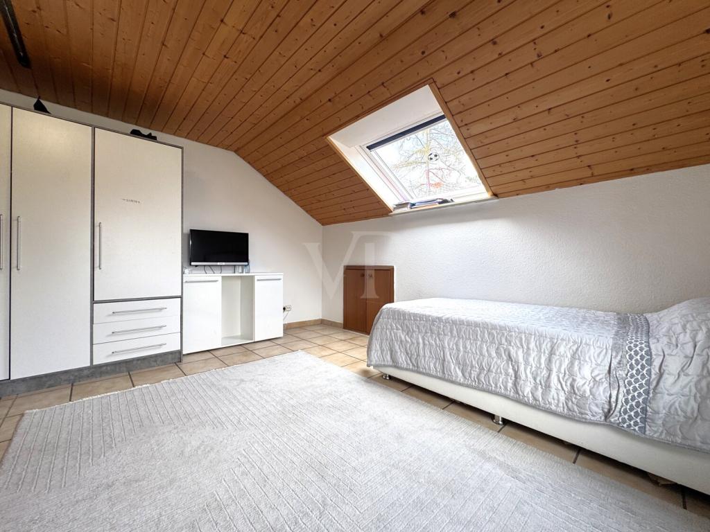 Familienfreundliche Wohnung mit Balkon, Gartenanteil & großzügiger Raumaufteilung - Foto 3