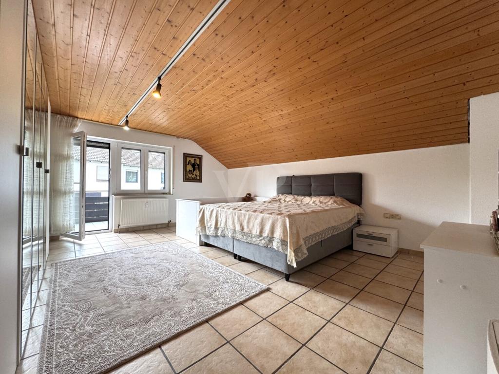 Familienfreundliche Wohnung mit Balkon, Gartenanteil & großzügiger Raumaufteilung - Foto 2