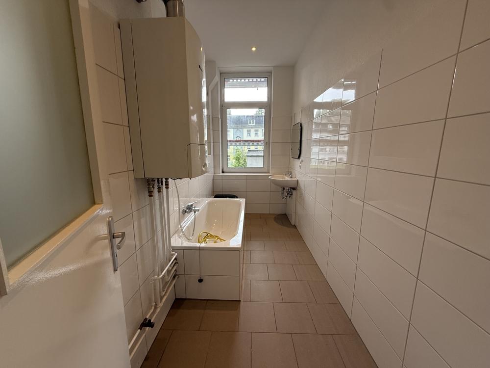Stilvolle Altbauwohnung mit Balkon und moderner Küche in zentraler Lage - Foto 5