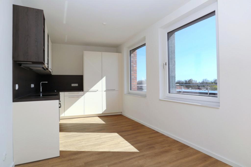 Neuwertige 3-Zimmer-Endetagenwohnung mit großzügiger Dachterrasse in Henstedt-Ulzburg - Photo 3