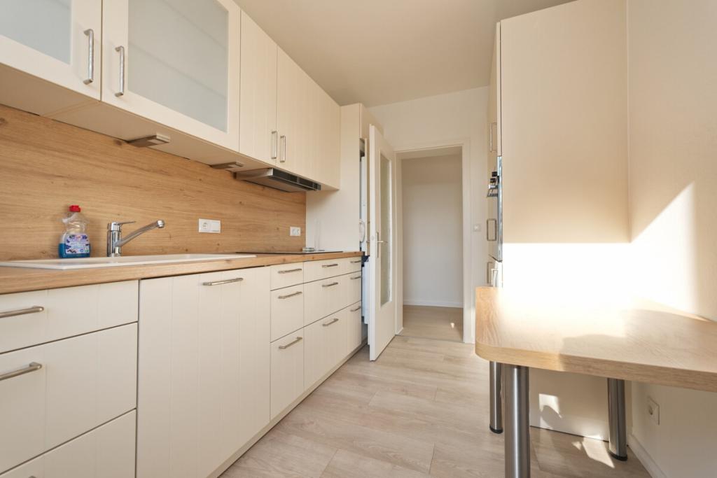 Gepflegte 3-Zimmer-Wohnung mit Loggia und hauseigenem Schwimmbad in Henstedt-Ulzburg - Photo 2