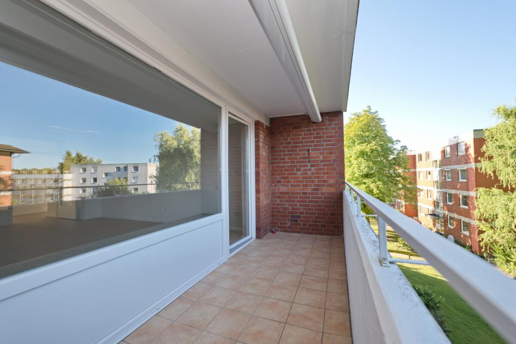 Gepflegte 3-Zimmer-Wohnung mit Loggia und hauseigenem Schwimmbad in Henstedt-Ulzburg - Photo 5