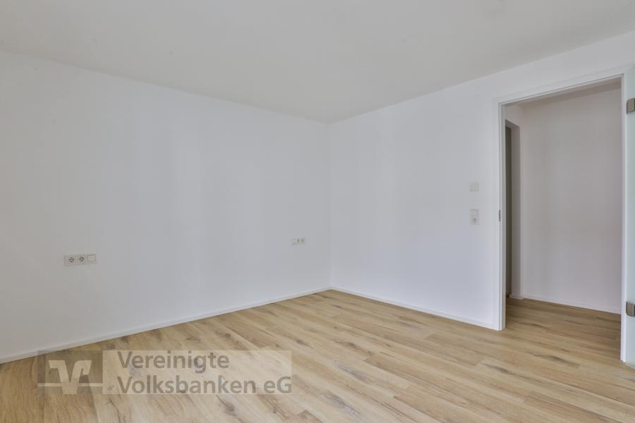 Neuwertige Wohnung mit Balkon + TG-Stellplatz in zentraler Lage! - Foto 5