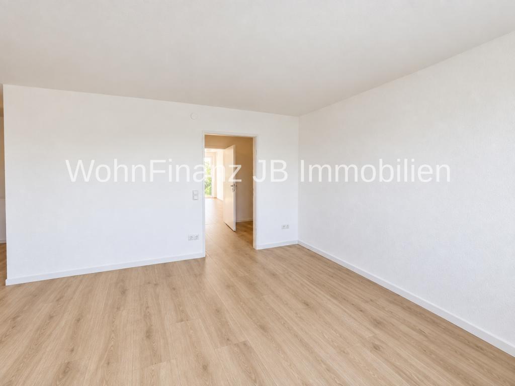 Moderne und helle Einraumwohnung mit Keller und Feldblick - Foto 5