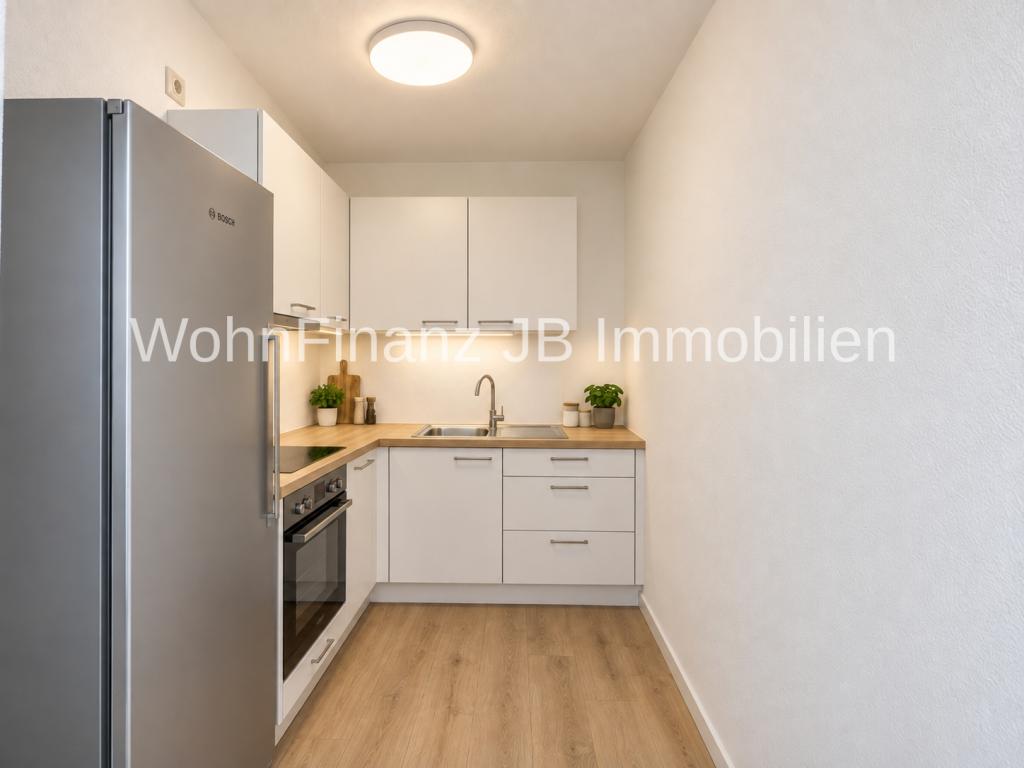 Moderne und helle Einraumwohnung mit Keller und Feldblick - Foto 3