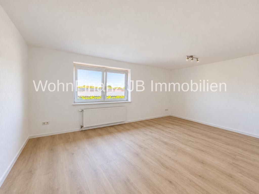 Moderne und helle Einraumwohnung mit Keller und Feldblick - Foto 1