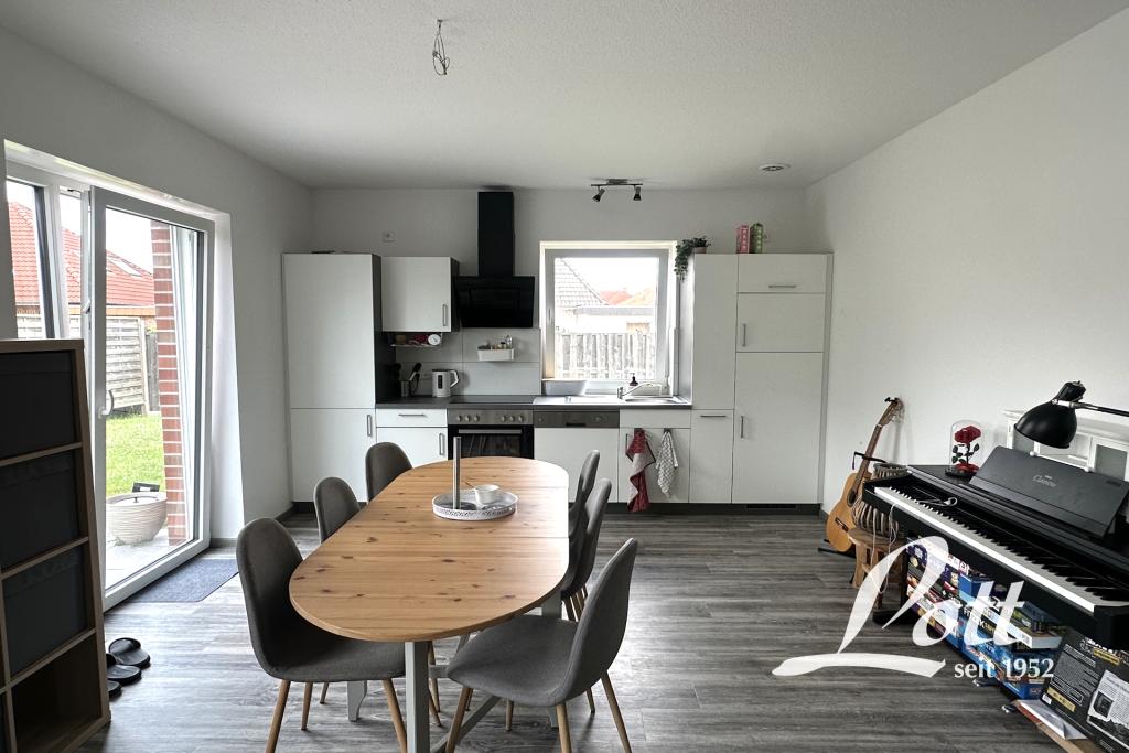 **Großzügig geschnittene Erdgeschosswohnung in zentraler Lage von Augustfehn** - Photo 4