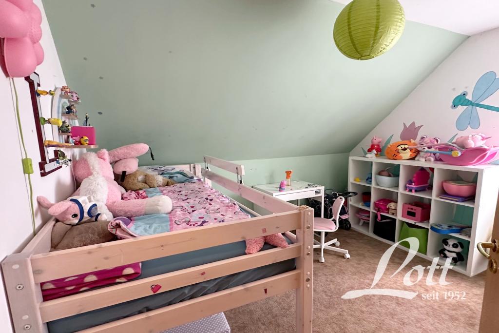 **Familienfreundliches Einfamilienhaus mit Garage in beliebter Wohnlage von Augustfehn!** - Photo 4