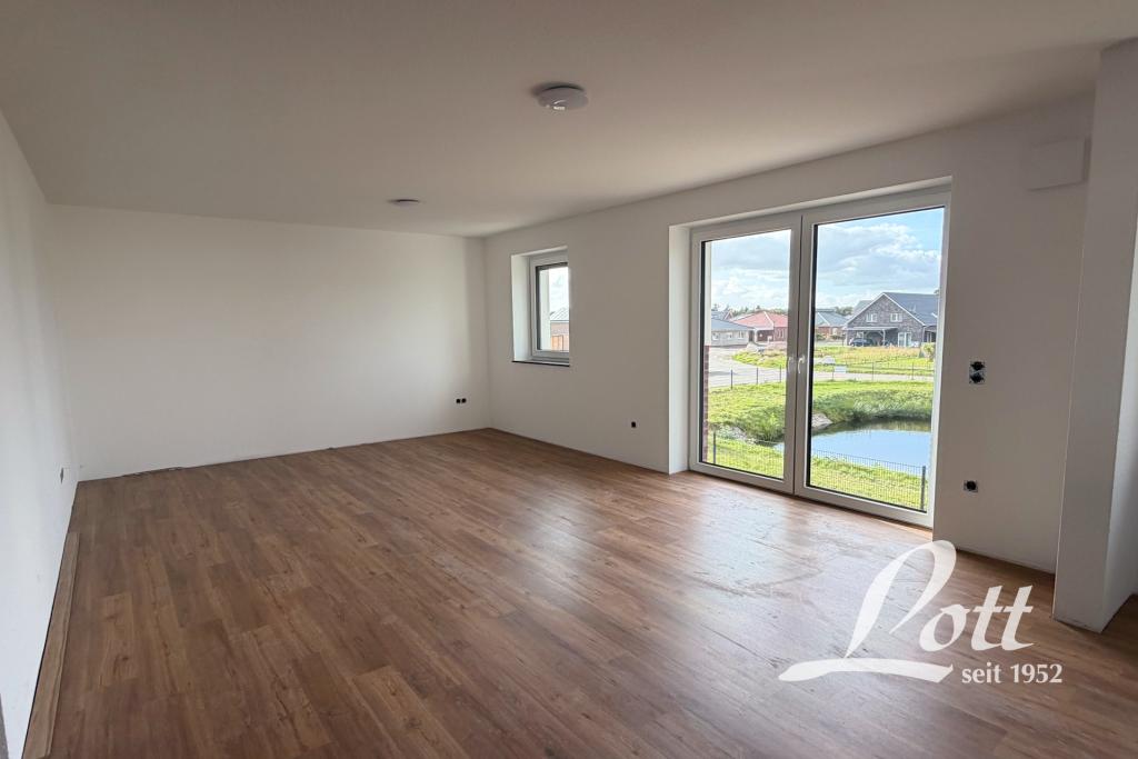 **Erstbezug! Obergeschosswohnung mit Balkon im beliebten Neubaugebiet in Barßelermoor!** - Foto 1