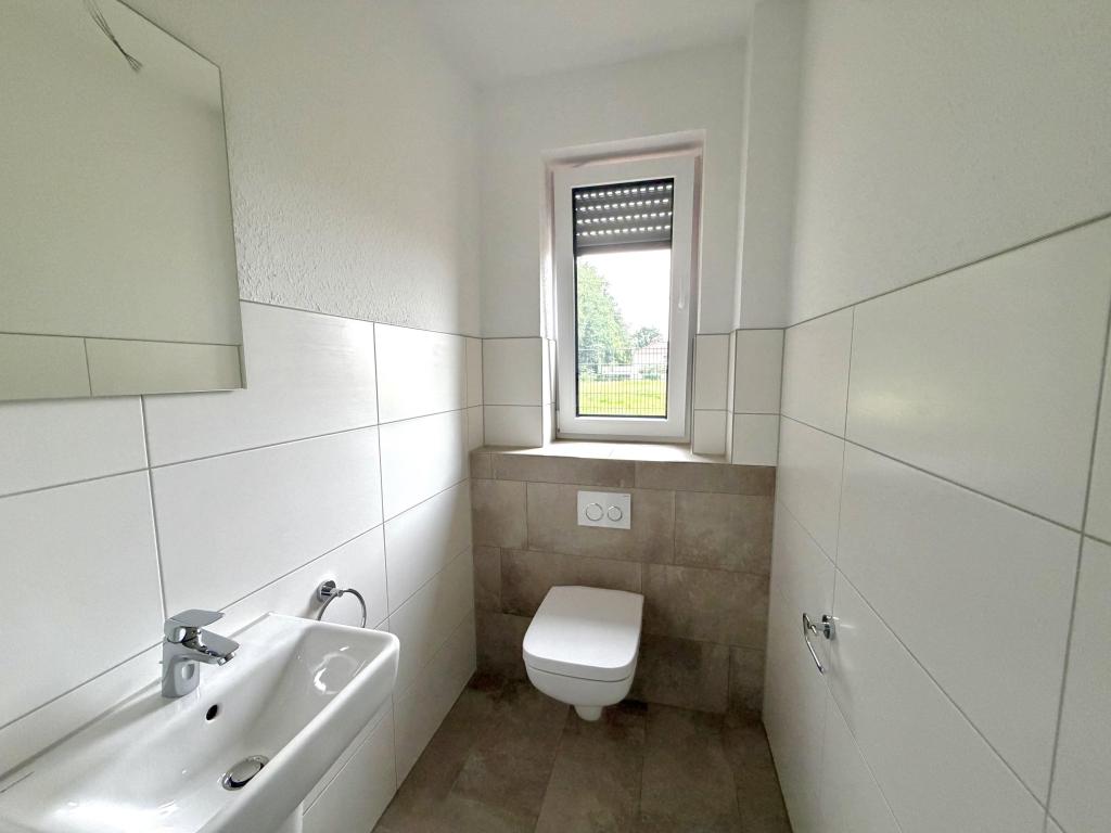 Erstbezug in moderner 3-Zimmer Erdgeschosswohnung in Cloppenburg! - Photo 4