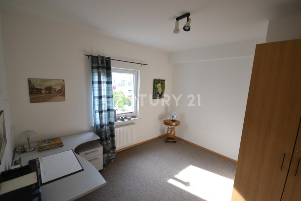 Zimmer im EG Maisonette-Wohnung