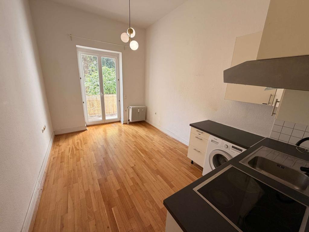 Charmante Altbauwohnung mit Balkon und Gartenblick im Herzen von Düsseldorf - Photo 2