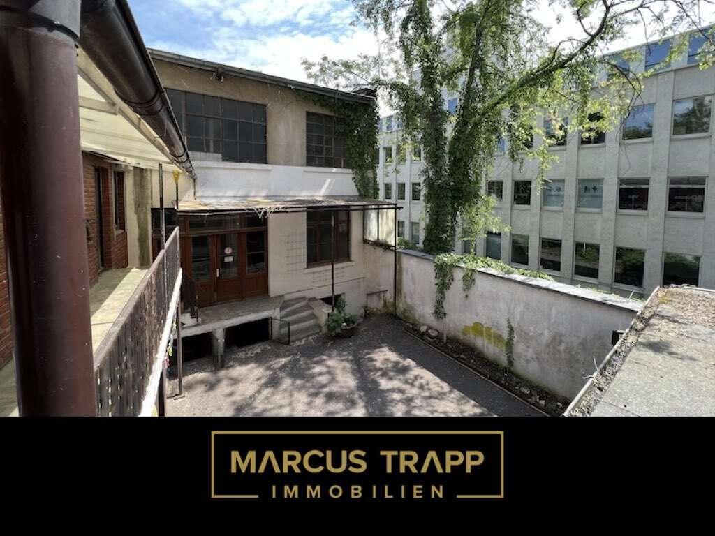 Startbild_Logo_Marcus Trapp Immobilien_schwarz.001