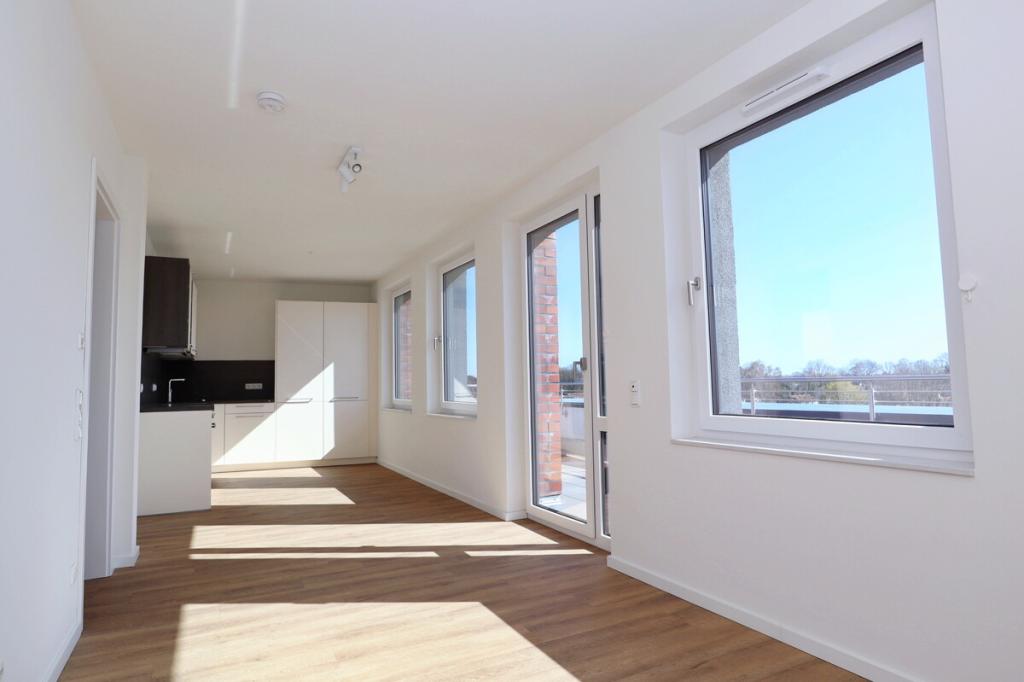 Neuwertige 3-Zimmer-Endetagenwohnung mit großzügiger Dachterrasse in Henstedt-Ulzburg - Photo 3